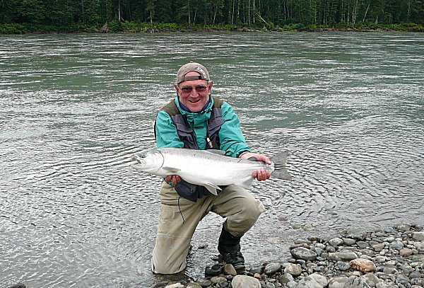 Jean Louis Preiser in British Columbia with a beautiful coho salmon