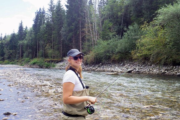 Sophie fly fishing in the river